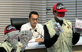 Tipikor  KPK Geledah Kantor  Pajak Jakut,  Uang, CCTV, & Laptop Disita